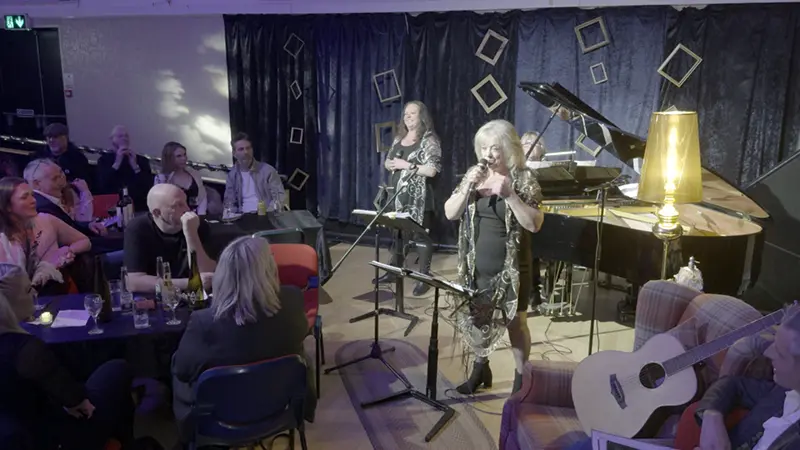 Image of Vinoz performing Medlay of songs  at Neuadd Dyfi, Aberdyfi