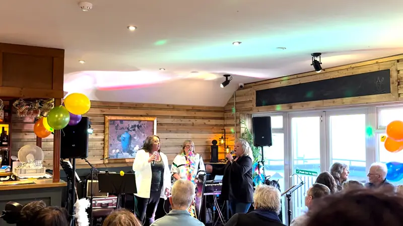 Image of Vinoz performing Medlay of songs  at Neuadd Dyfi, Aberdyfi